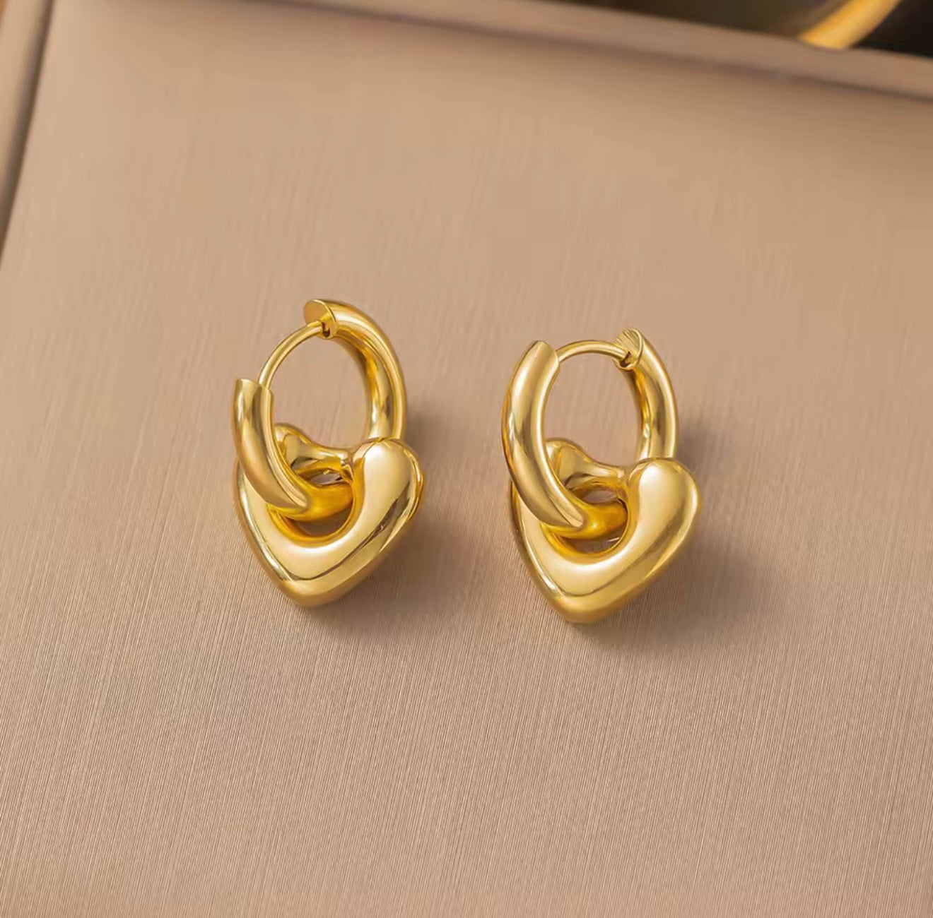 Gold Hoop Earring With loose heart design