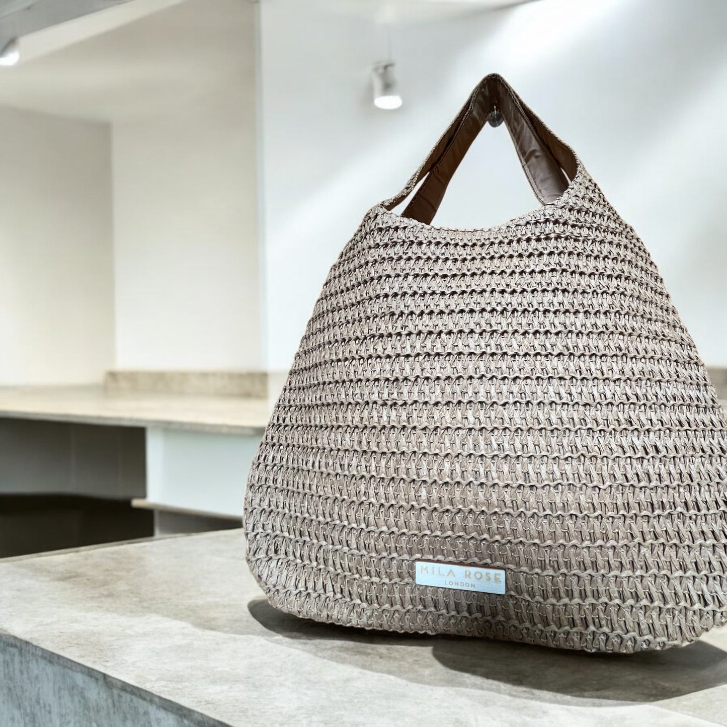 Elegant Large Capacity Summer Straw Shoulder Bag in sand with Zipped Compartment by Mila Rose London